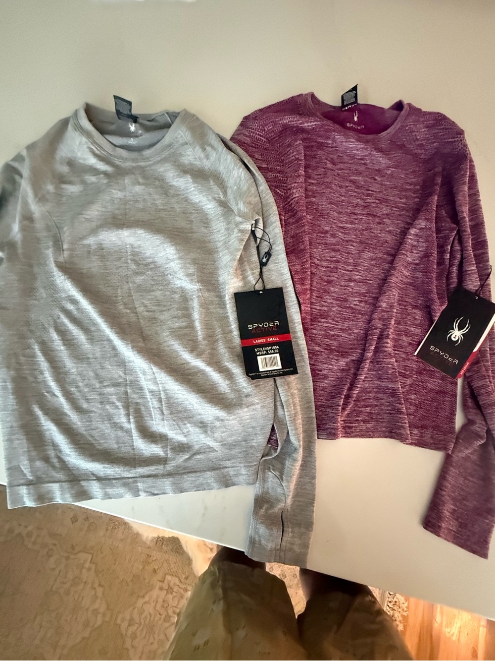 set of 2 Spyder seamless long sleeve tops , NWT SZ Small